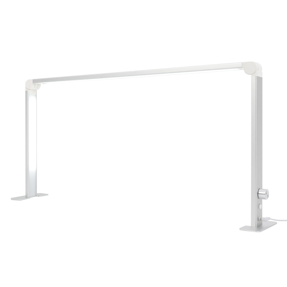 Silver foldable LED nail desk lamp, unfolded and switched on