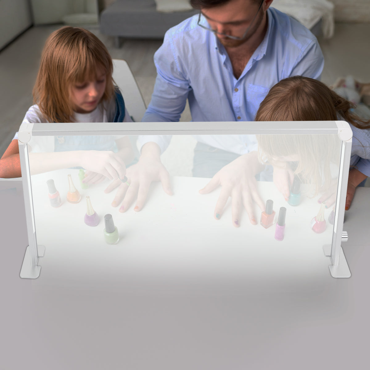 Nail art being painted under the foldable LED desk lamp